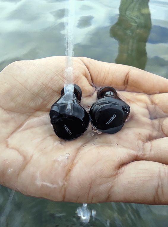 NC7 earbuds in the water