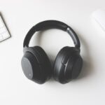 Copper flux demodulation ring in dynamic headphone motor